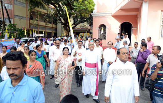 vehicle rally carrying the  statue of Pope John Paul II